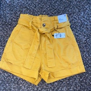 Express golden yellow super high wasted shorts